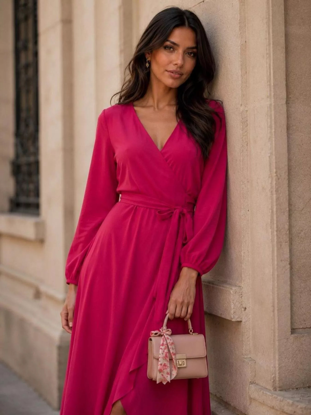 Scarlet long sleeve wrap dress with tied waist and flowing high-low skirt
