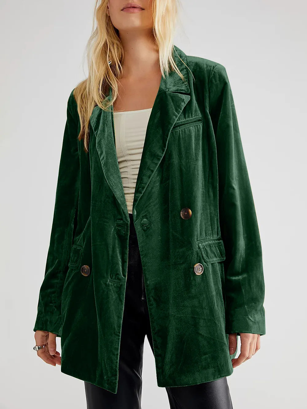 Dark green corduroy blazer with notch lapel, long sleeves, and button pockets