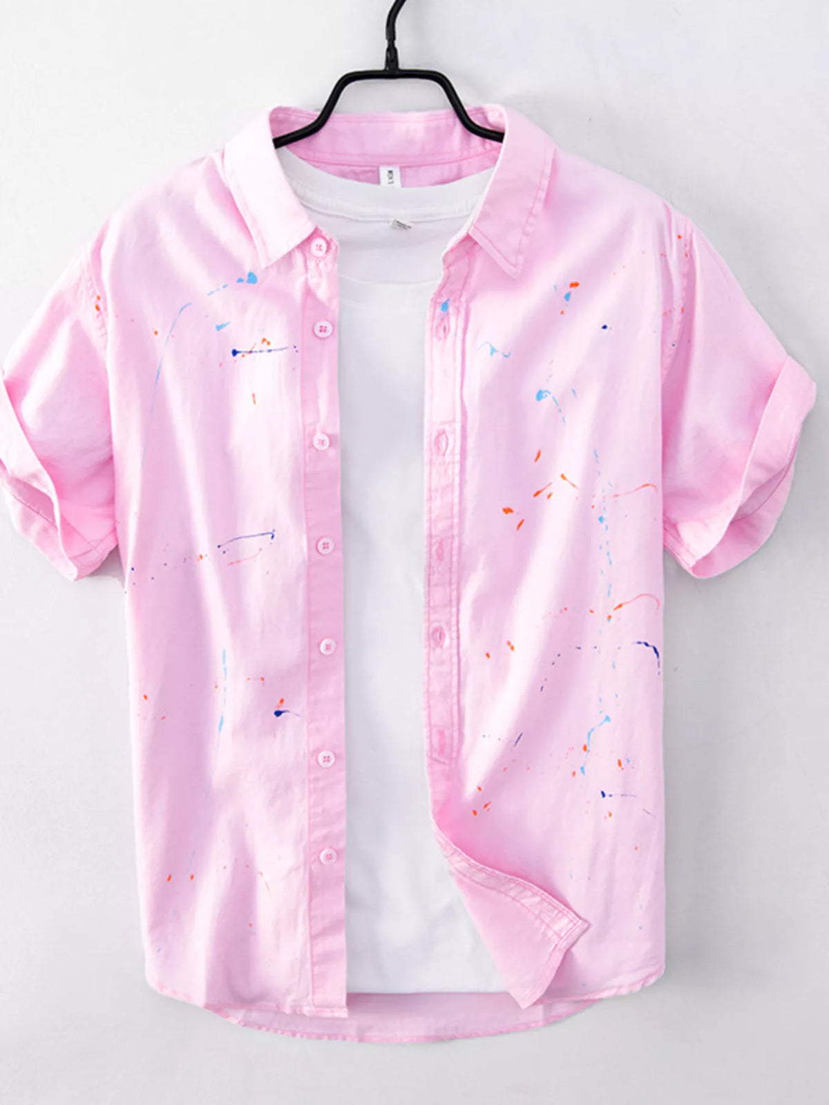 Men's short-sleeve button-up cotton shirt in pink with multicolor speckle print