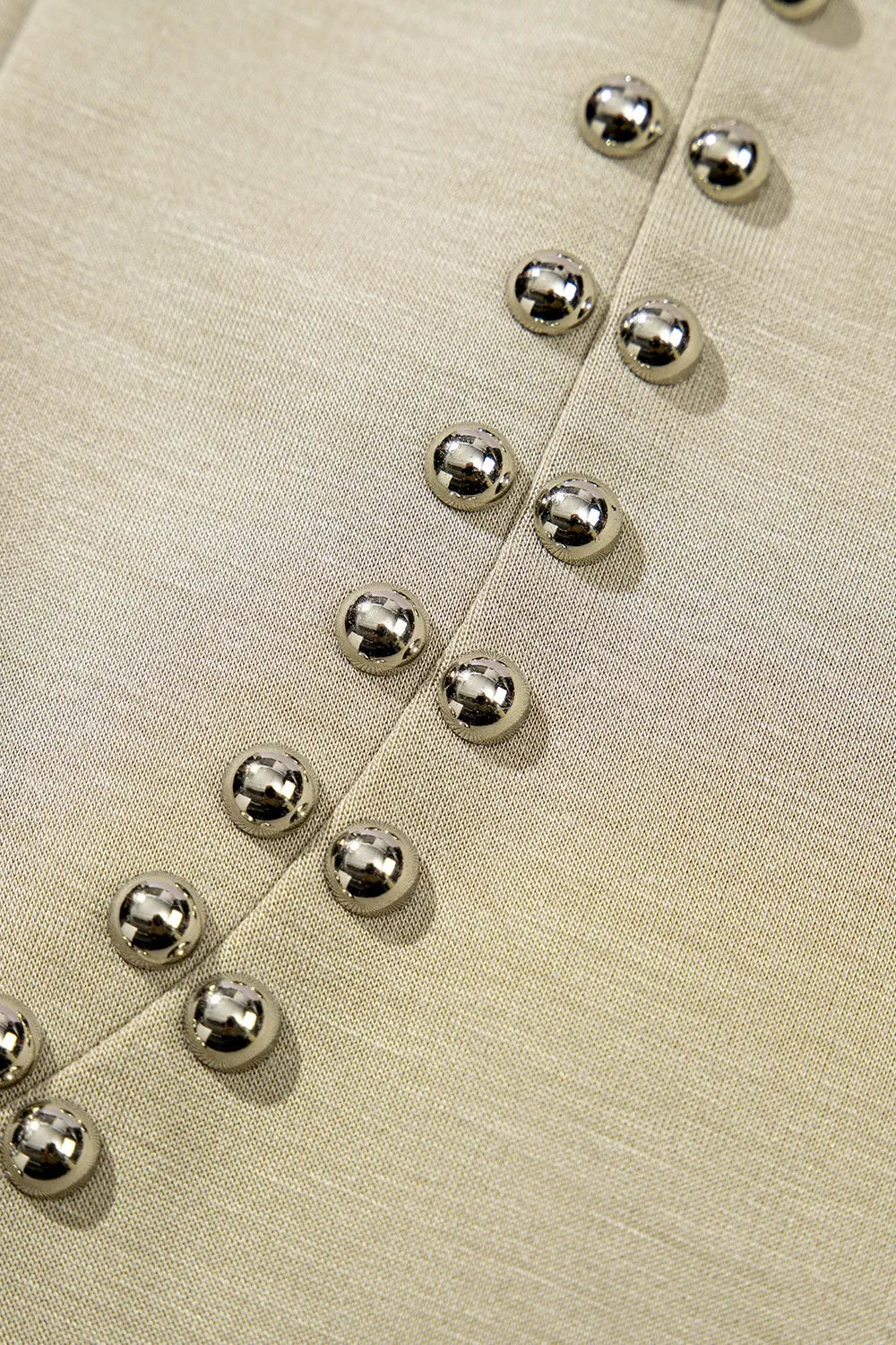 Cedar & Moore Studded cap sleeve round-neck T shirt in beige with silver studs along front seam