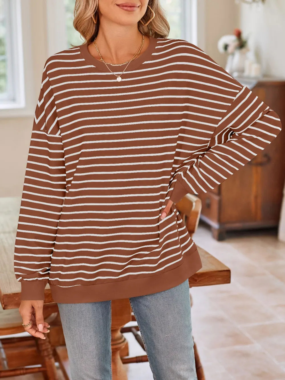 Striped long-sleeve sweatshirt with round neck, brown-and-white horizontal stripes, relaxed fit