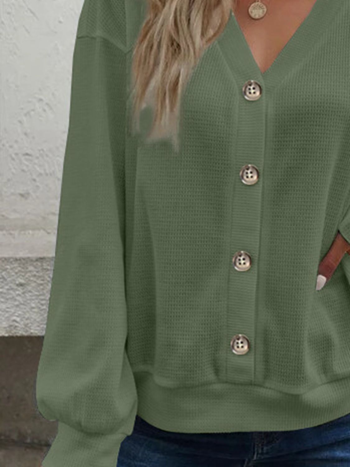 Matcha green blouse with V-neck and front button placket detail, long sleeves