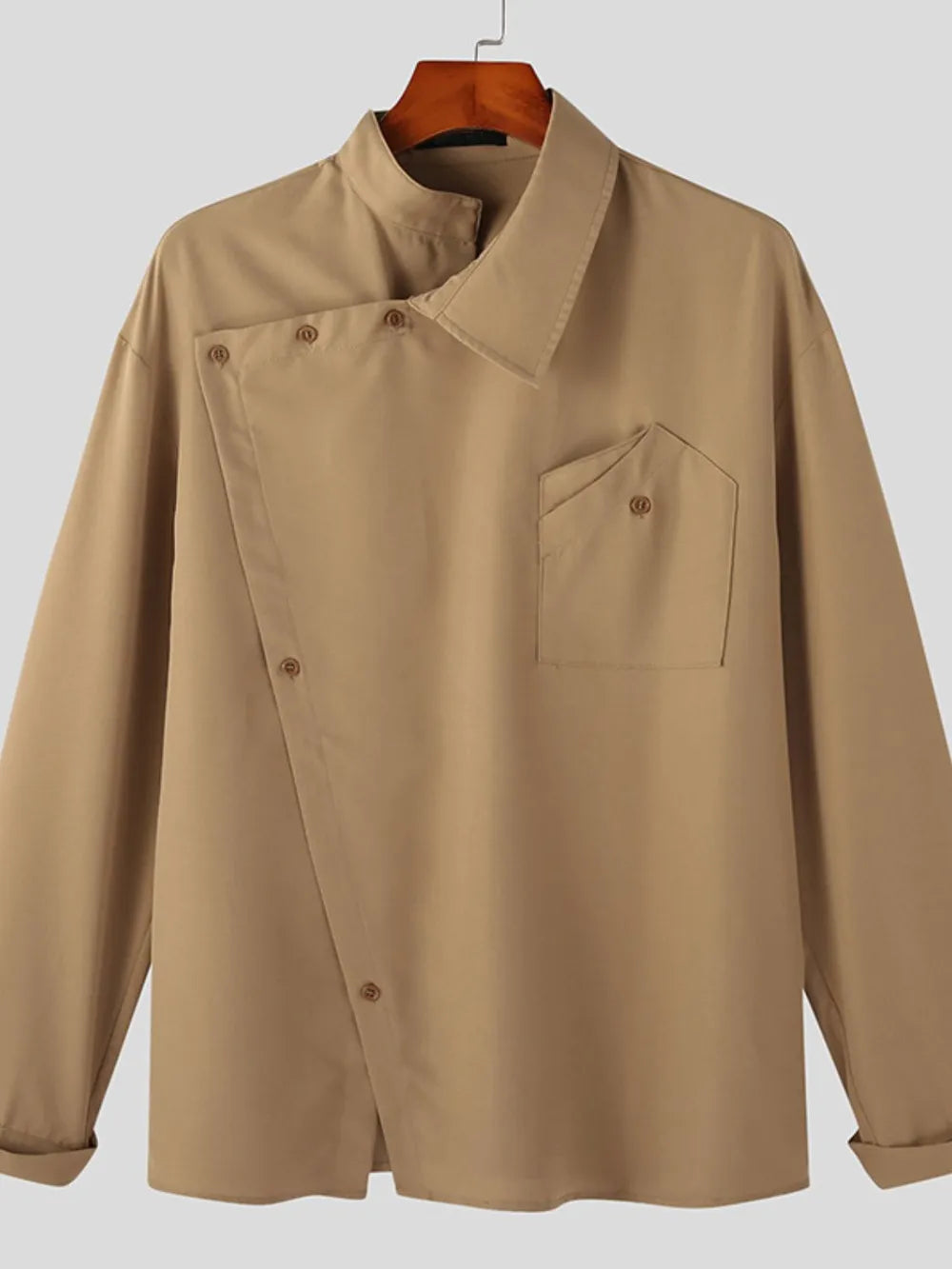 Camel asymmetrical long sleeve shirt on hanger with mandarin collar and chest pocket