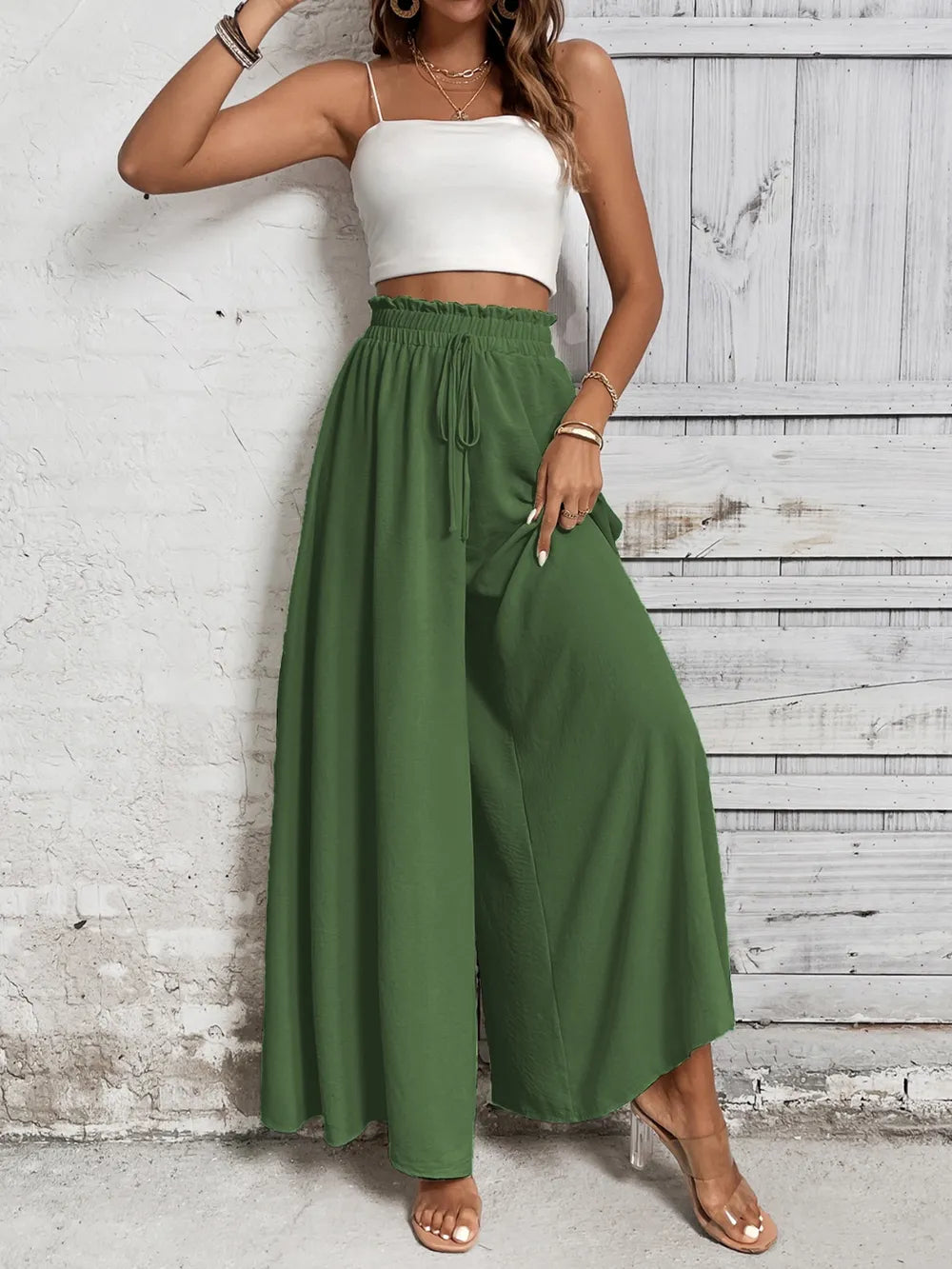 High-waist wide-leg pants in deep green with drawstring tie and gathered elastic waist