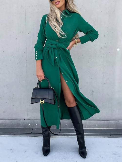 Dark green long shirt dress with button front, tied waist, side slit and long sleeves