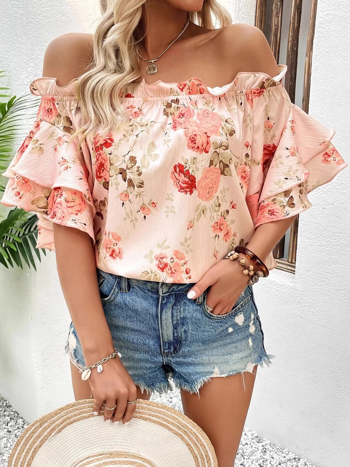 Floral print off-shoulder blouse with double ruffle sleeves in pink.