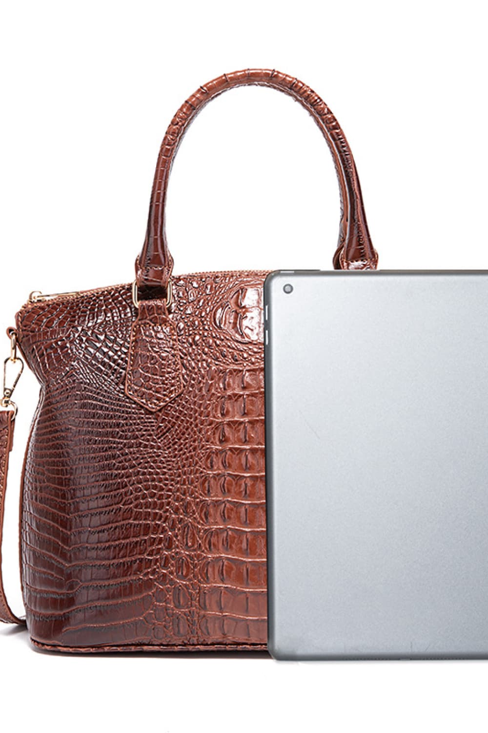 Dark brown croc-embossed handbag with top handles and detachable crossbody strap