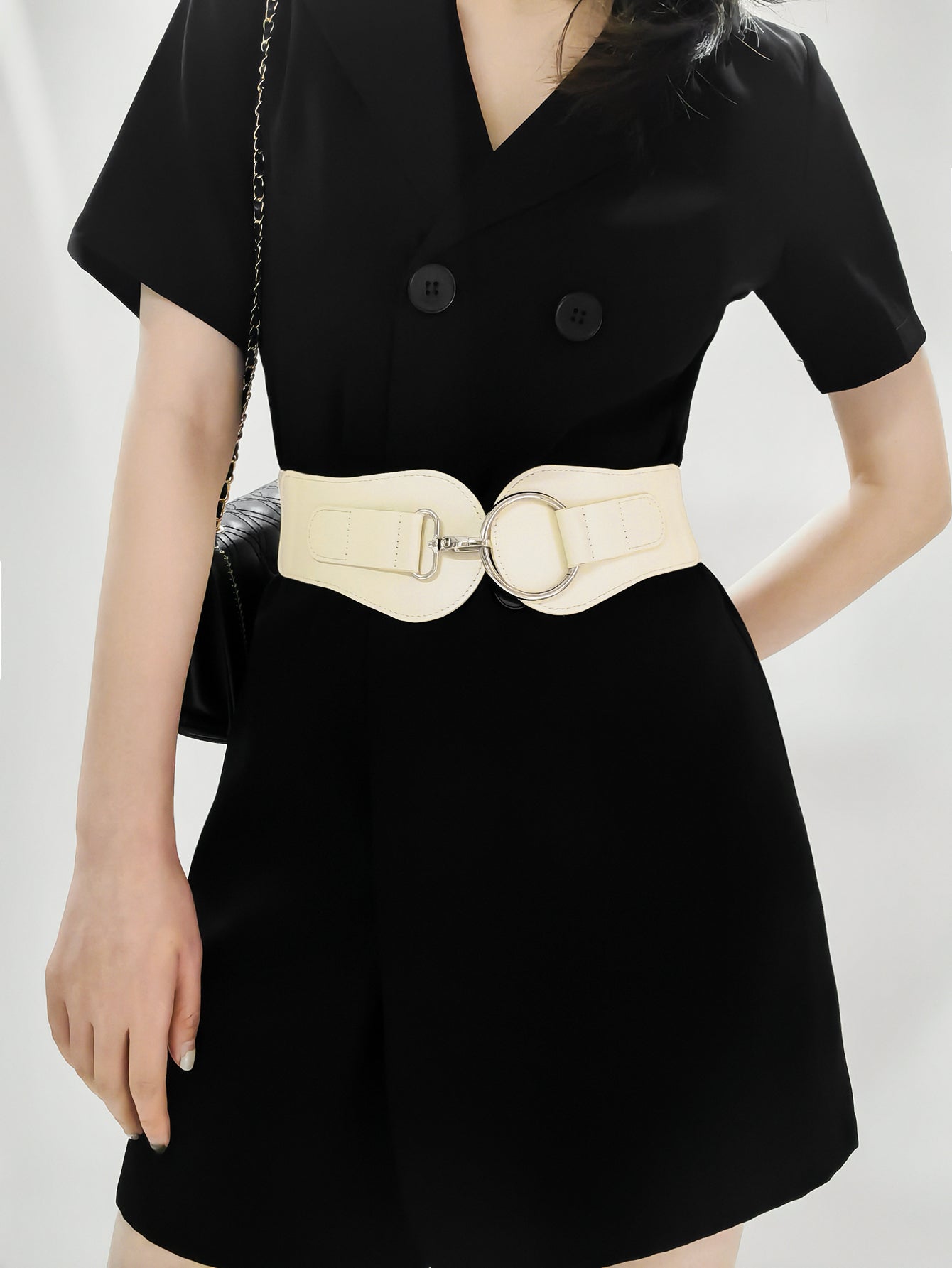 Vegan leather elastic wide belt in cream with circular buckle detail