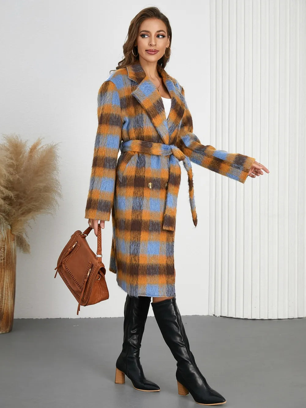Plaid collared neck coat with waist tie belt, long sleeves, knee-length hem.