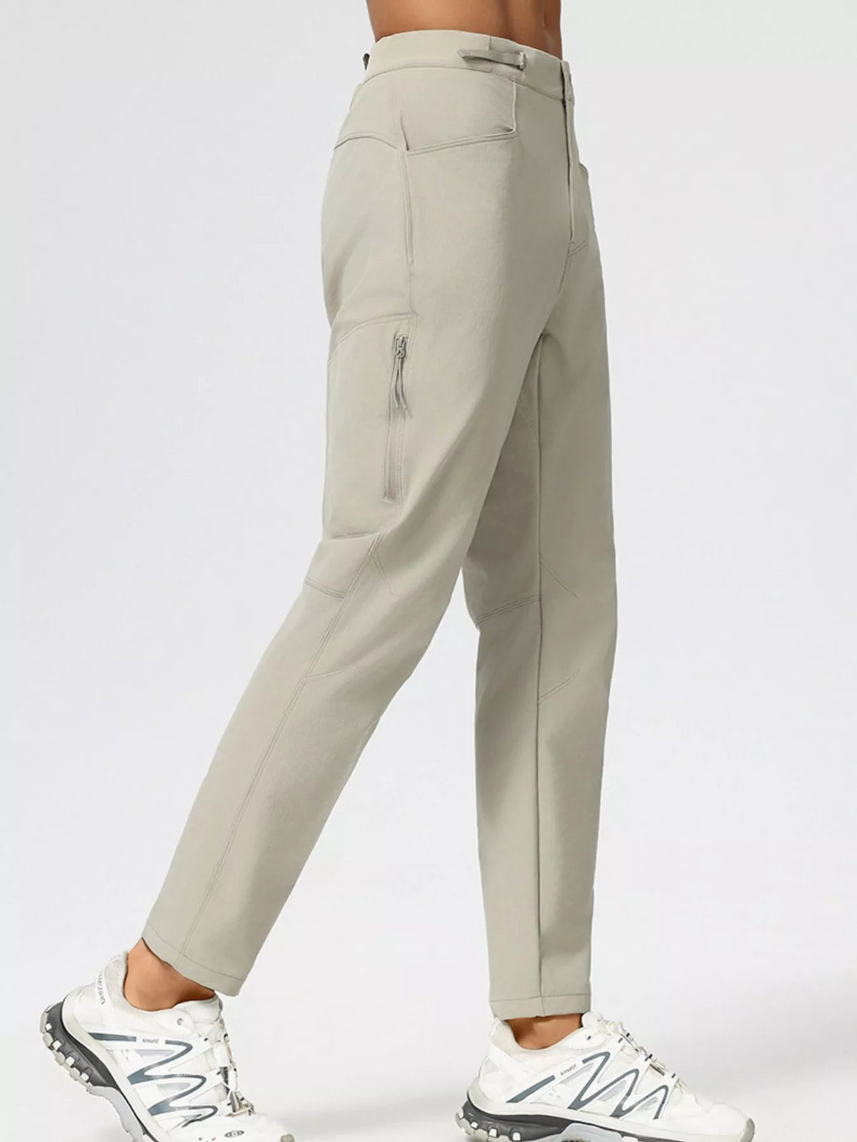Men's slim fit stretch casual pants, light khaki, side view with front pockets