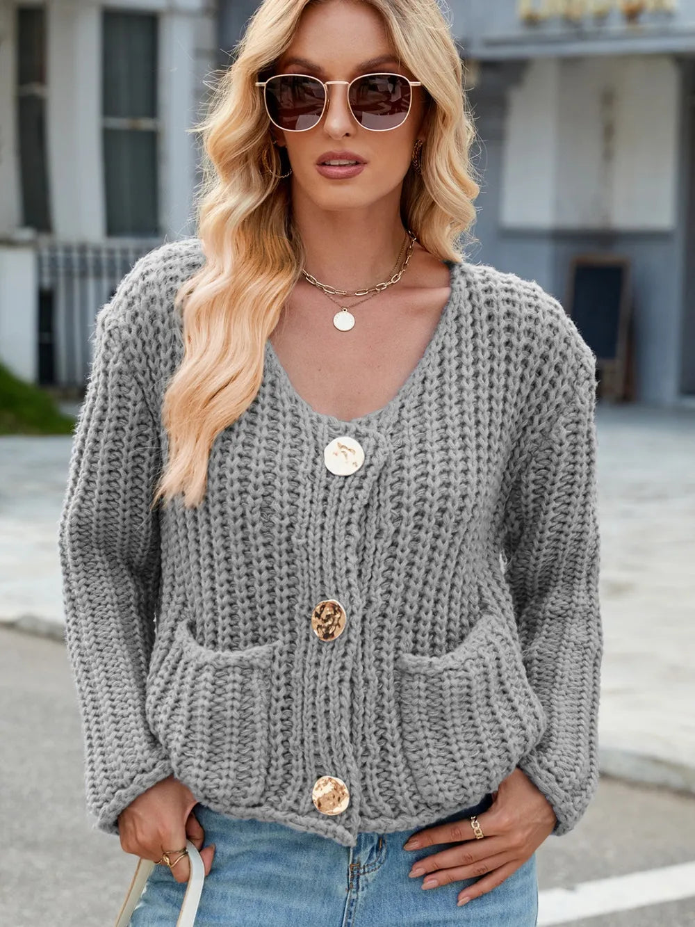 Gray round-neck button cardigan with long sleeves and front patch pockets