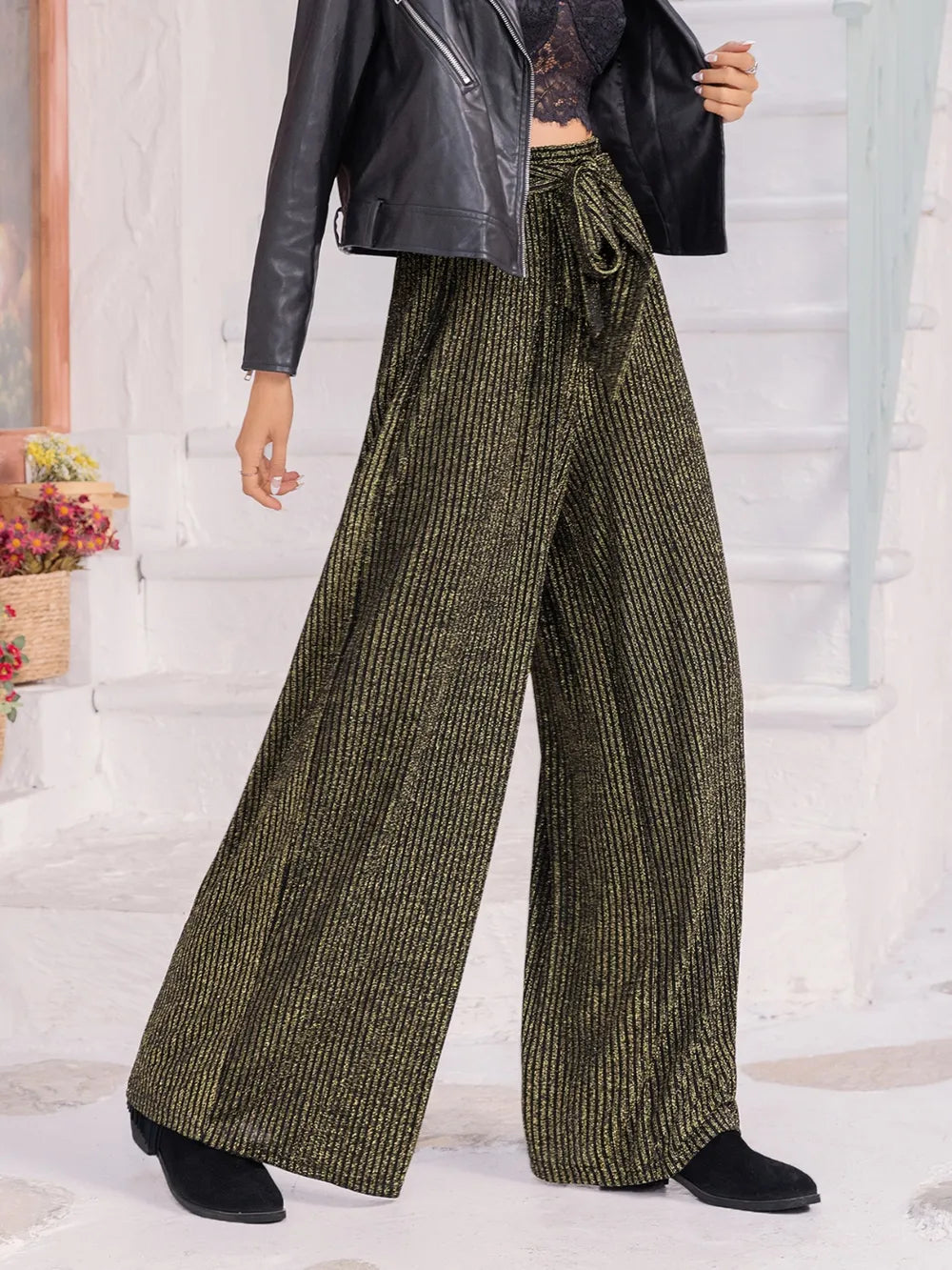 Dark green ribbed wide-leg pants with long drape and drawstring waist tie