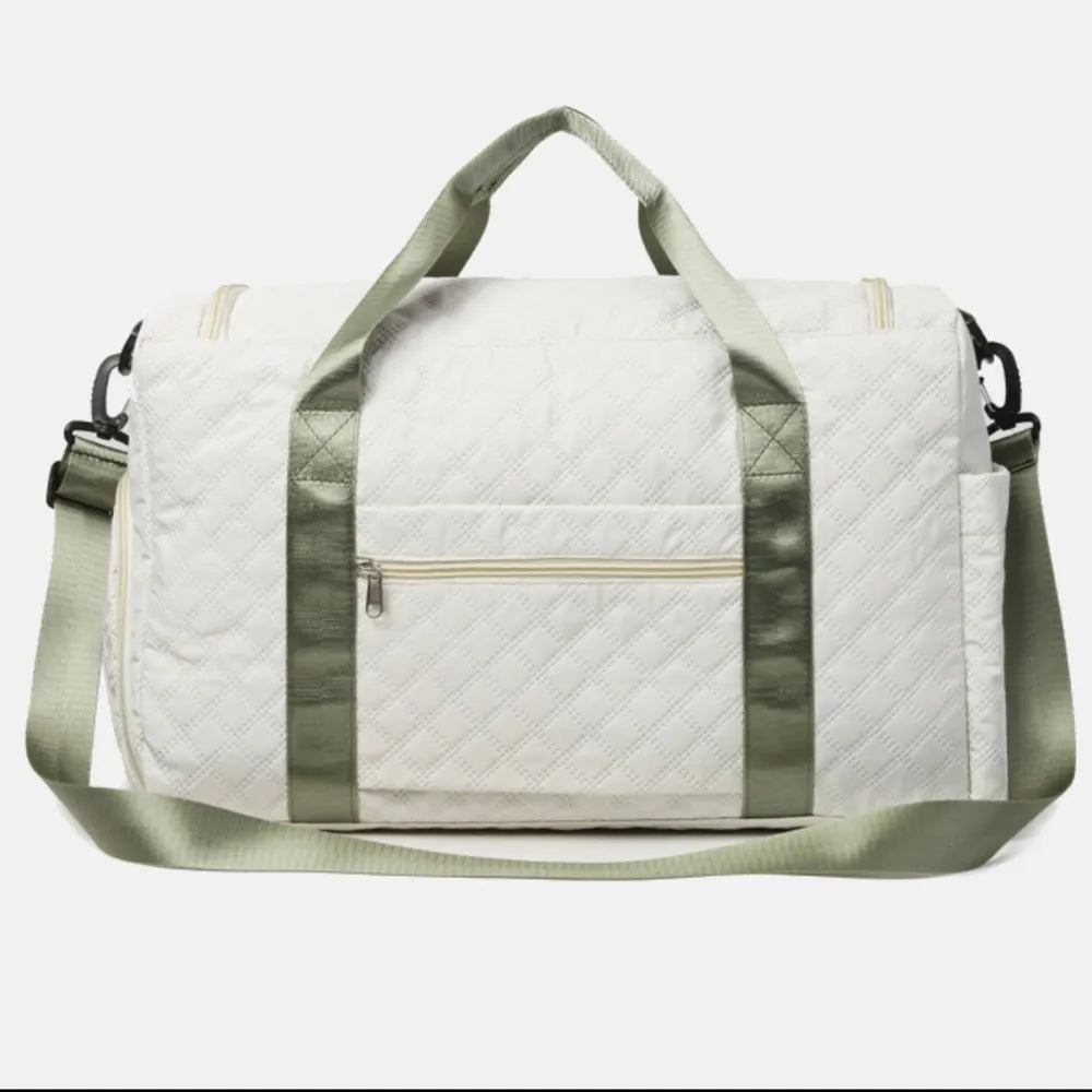 White duffel travel bag with long side strap and front zip compartment