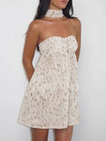 Sweetheart Neck Tube Mini Dress in ivory, strapless with ruched bust and dotted lace pattern by Trendsi.