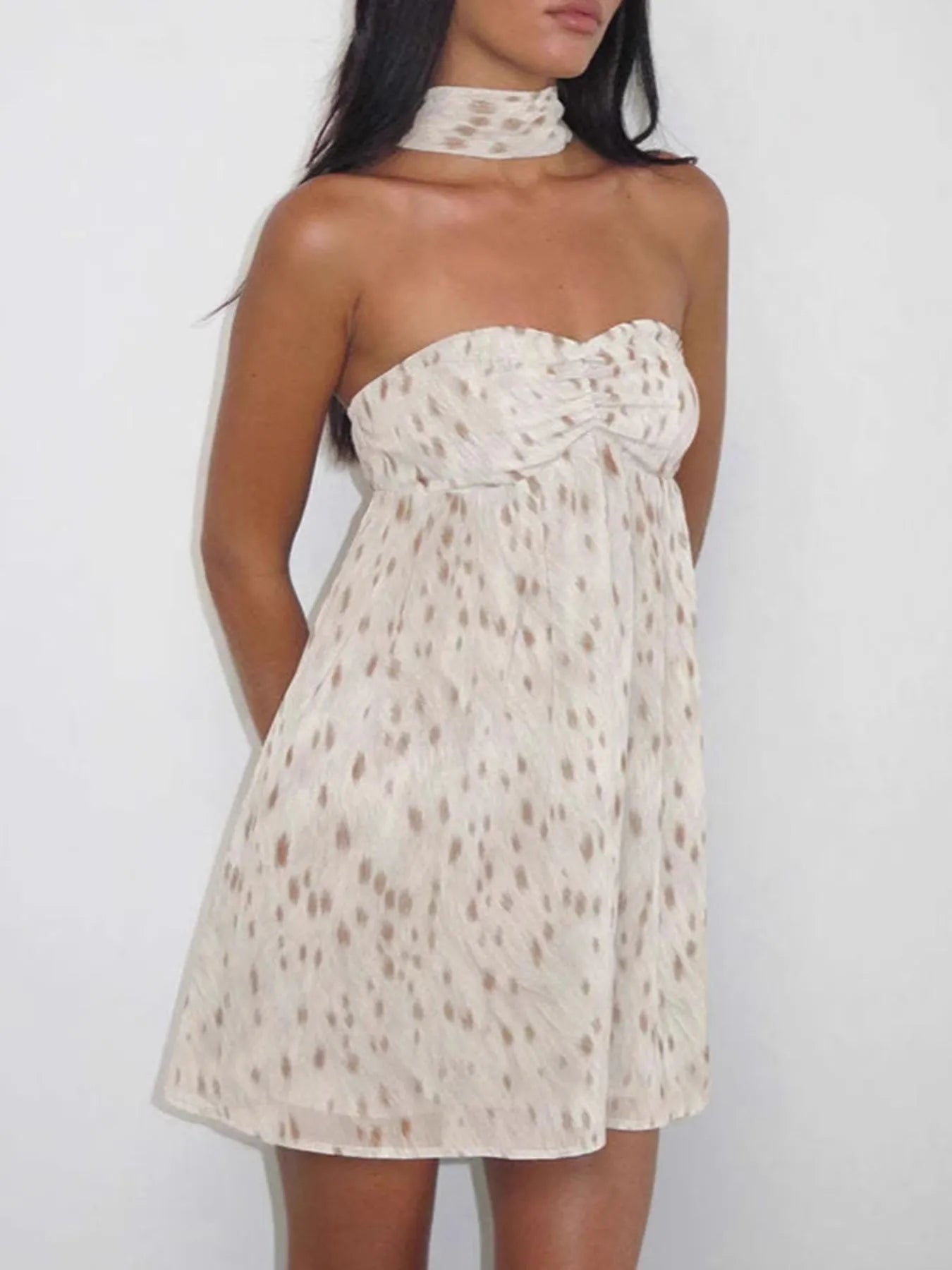 Sweetheart Neck Tube Mini Dress in ivory, strapless with ruched bust and dotted lace pattern by Trendsi.