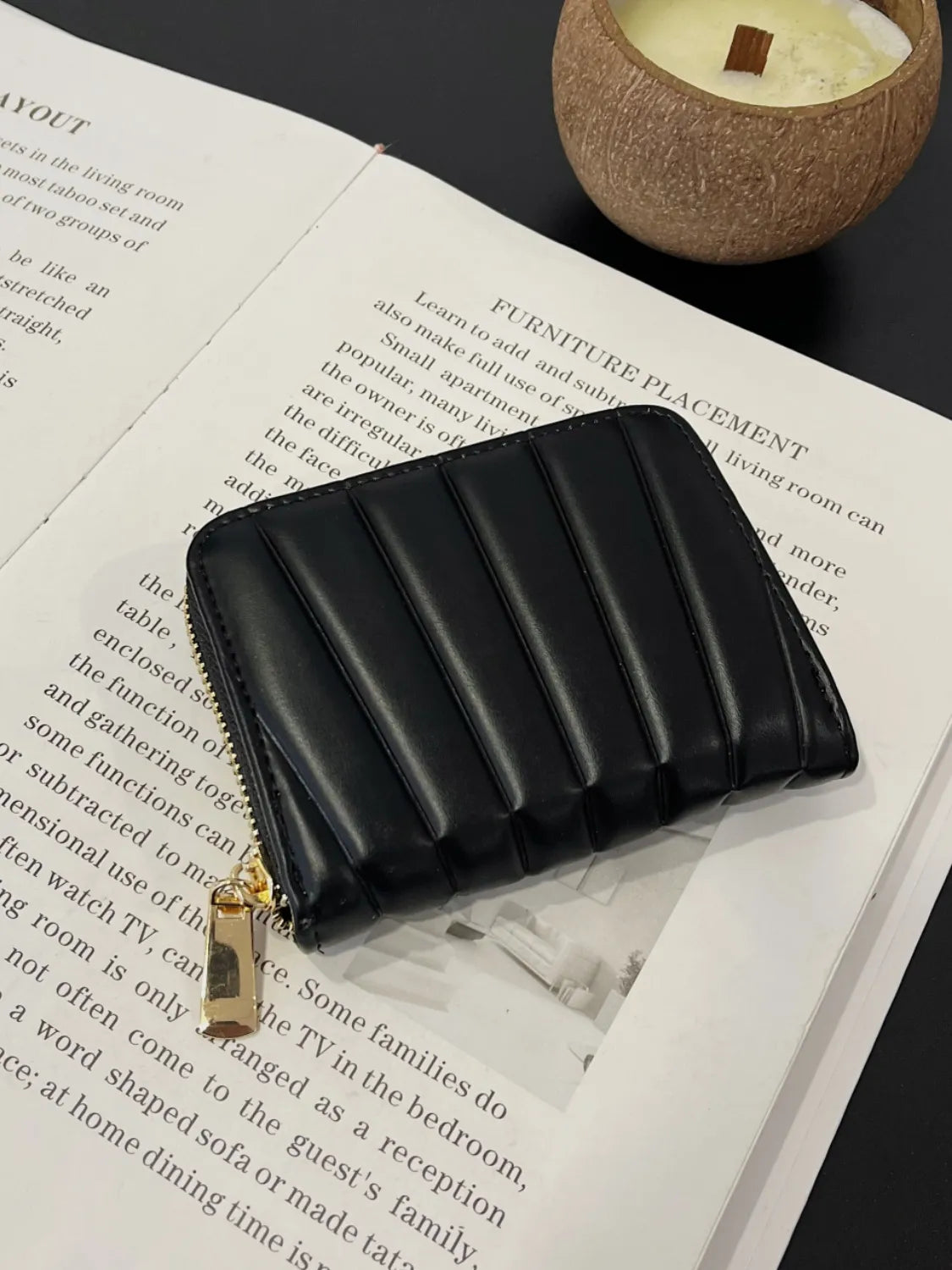 Black mini vegan leather wallet with quilted panels and gold-tone zipper
