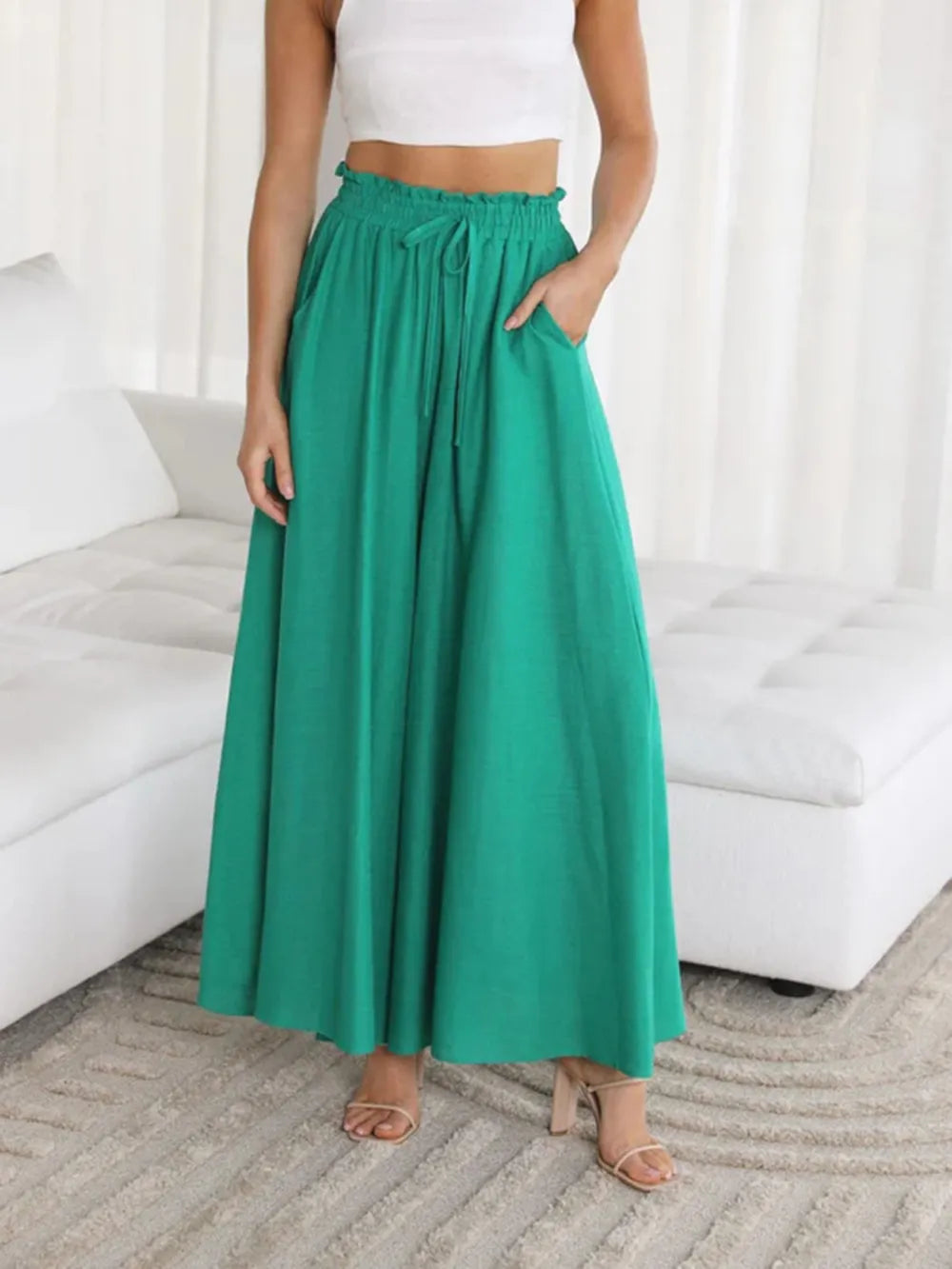 Matcha green wide-leg pants with elastic waistband, drawstring, and side pockets