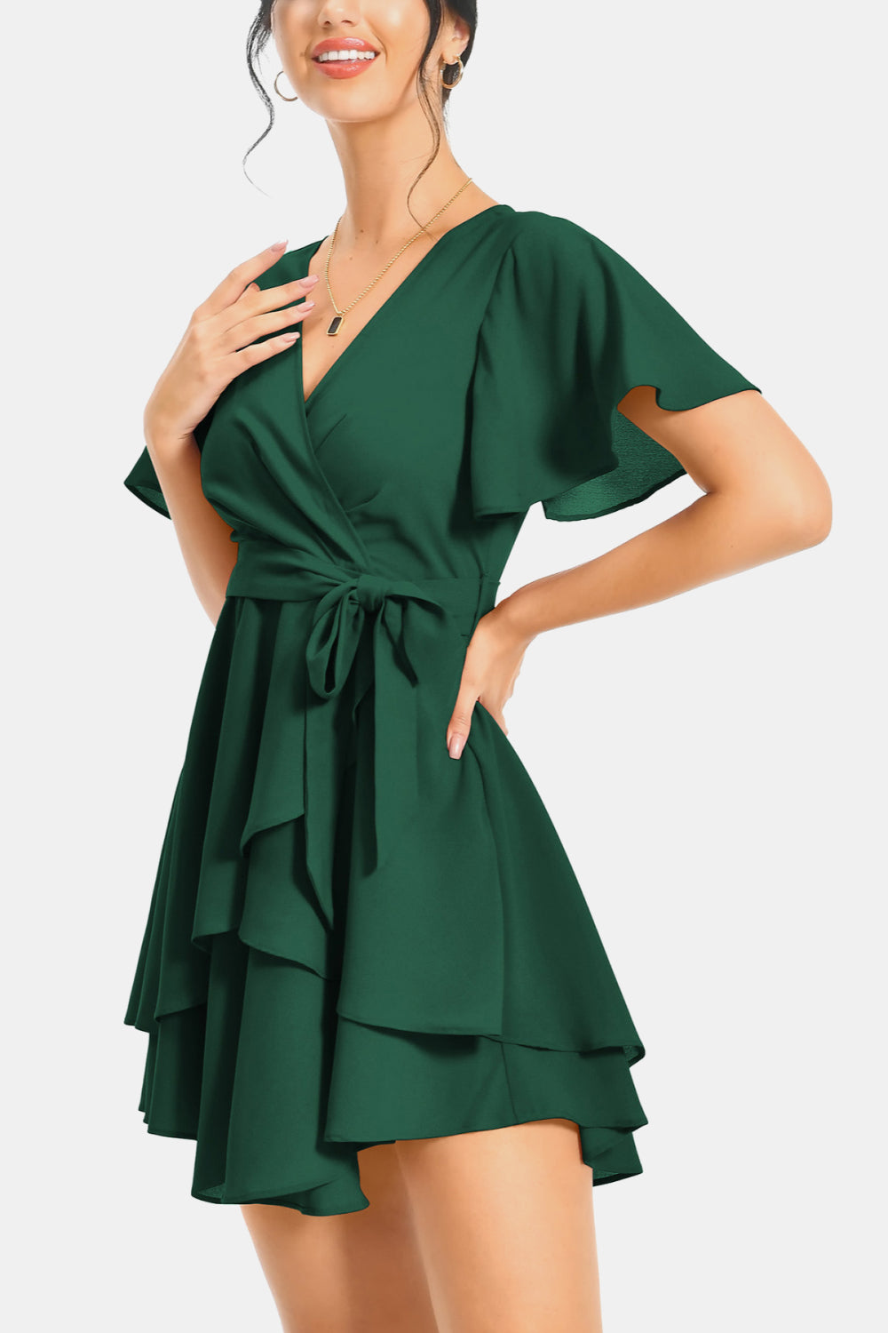 Dark green surplice V-neck flutter sleeve mini dress with layered ruffle skirt