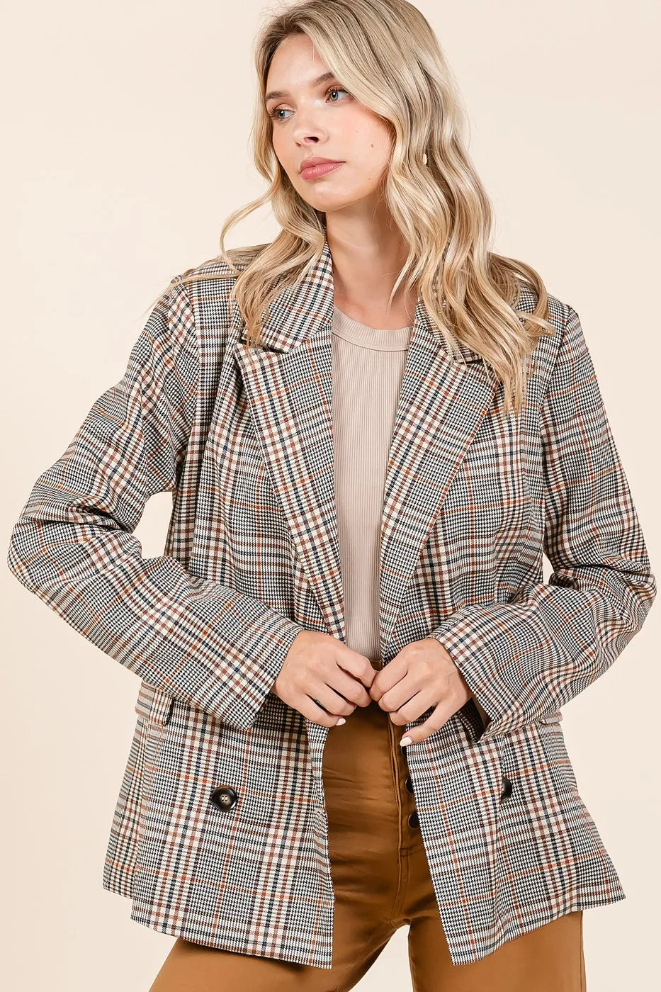 Brown plaid double-breasted blazer with notch lapels and long sleeves