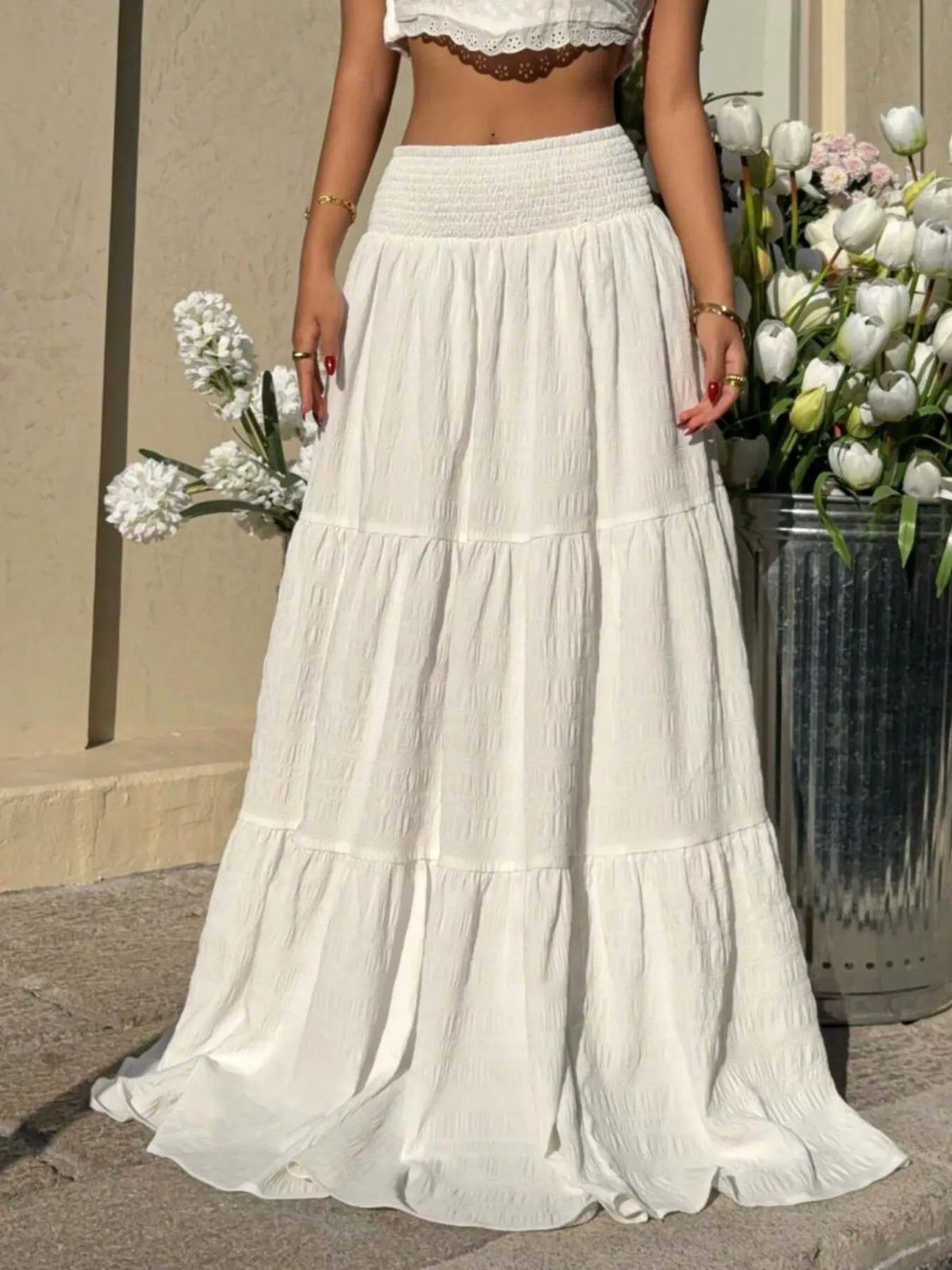 White smocked tiered maxi skirt with flowy ruffled tiers