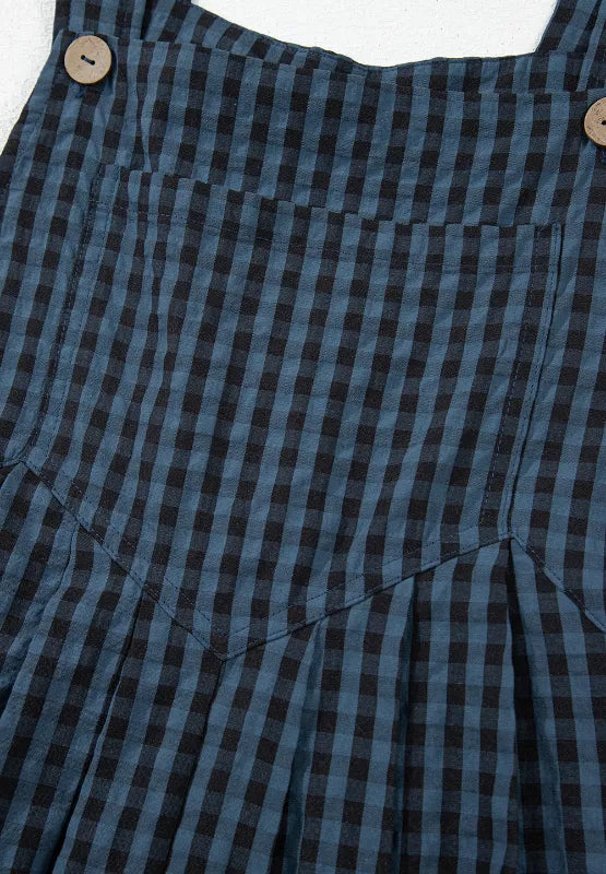 Dark blue plaid overalls neckline with wide strap and button placket