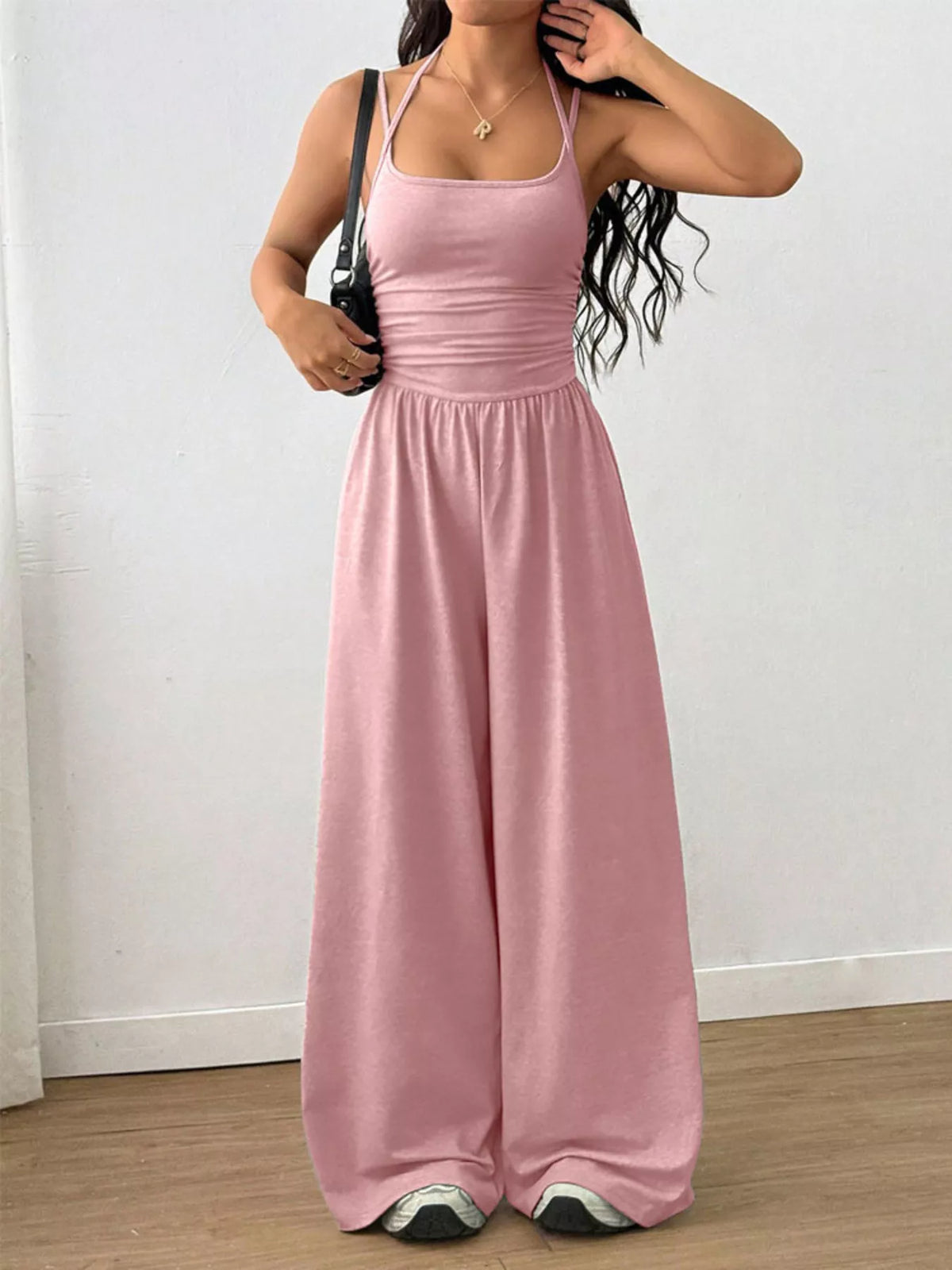 Pink ruched spaghetti strap wide-leg jumpsuit with gathered waist