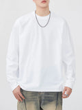White long-sleeve T-shirt with round neck, relaxed fit