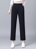 Loose fit elastic waist pants, black cropped with relaxed straight legs