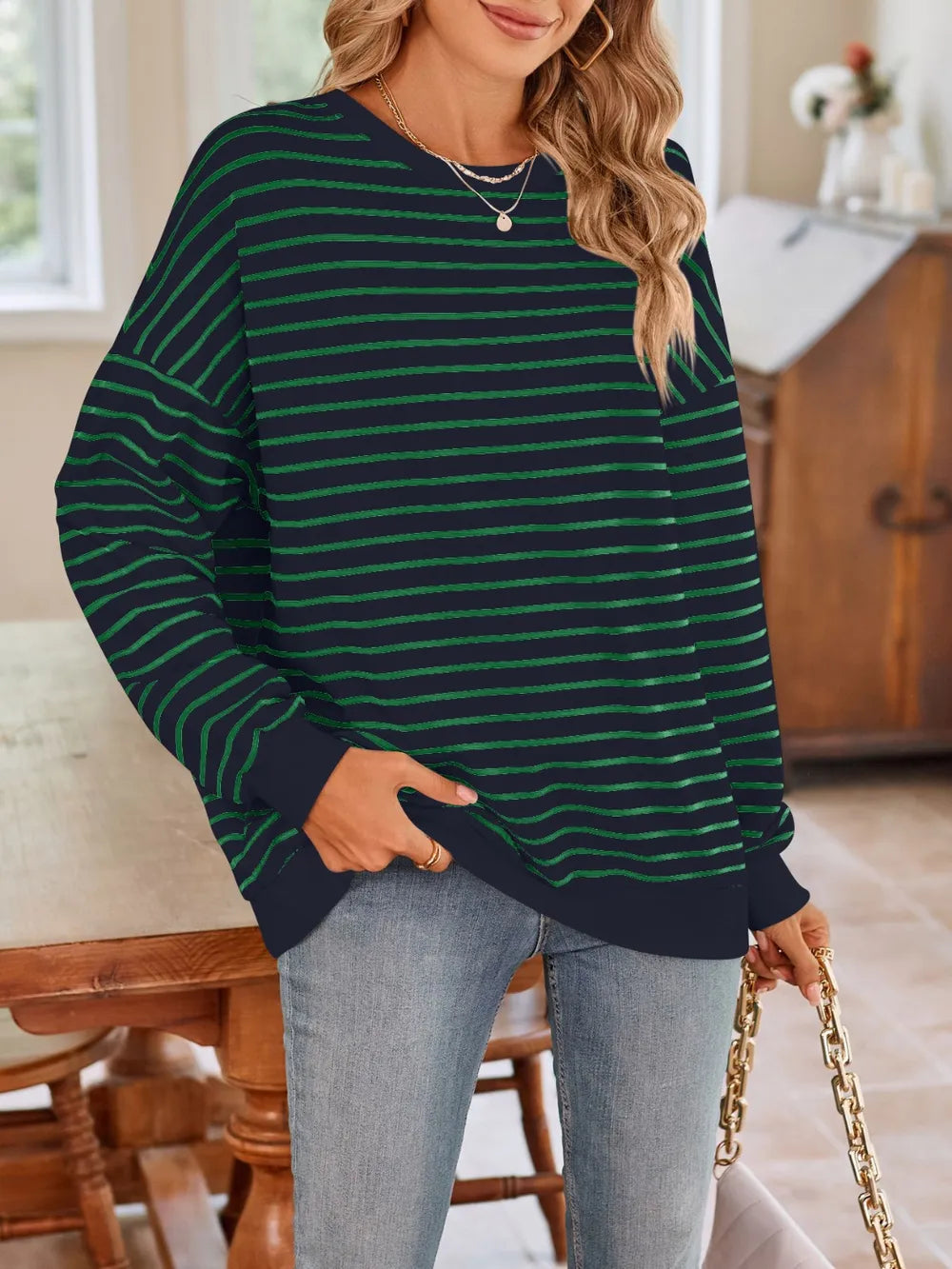 Striped round-neck long-sleeve sweatshirt in dark green with thin green stripes