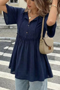 Ruffle-hem tie-neck blouse in navy with buttoned front, Trendsi