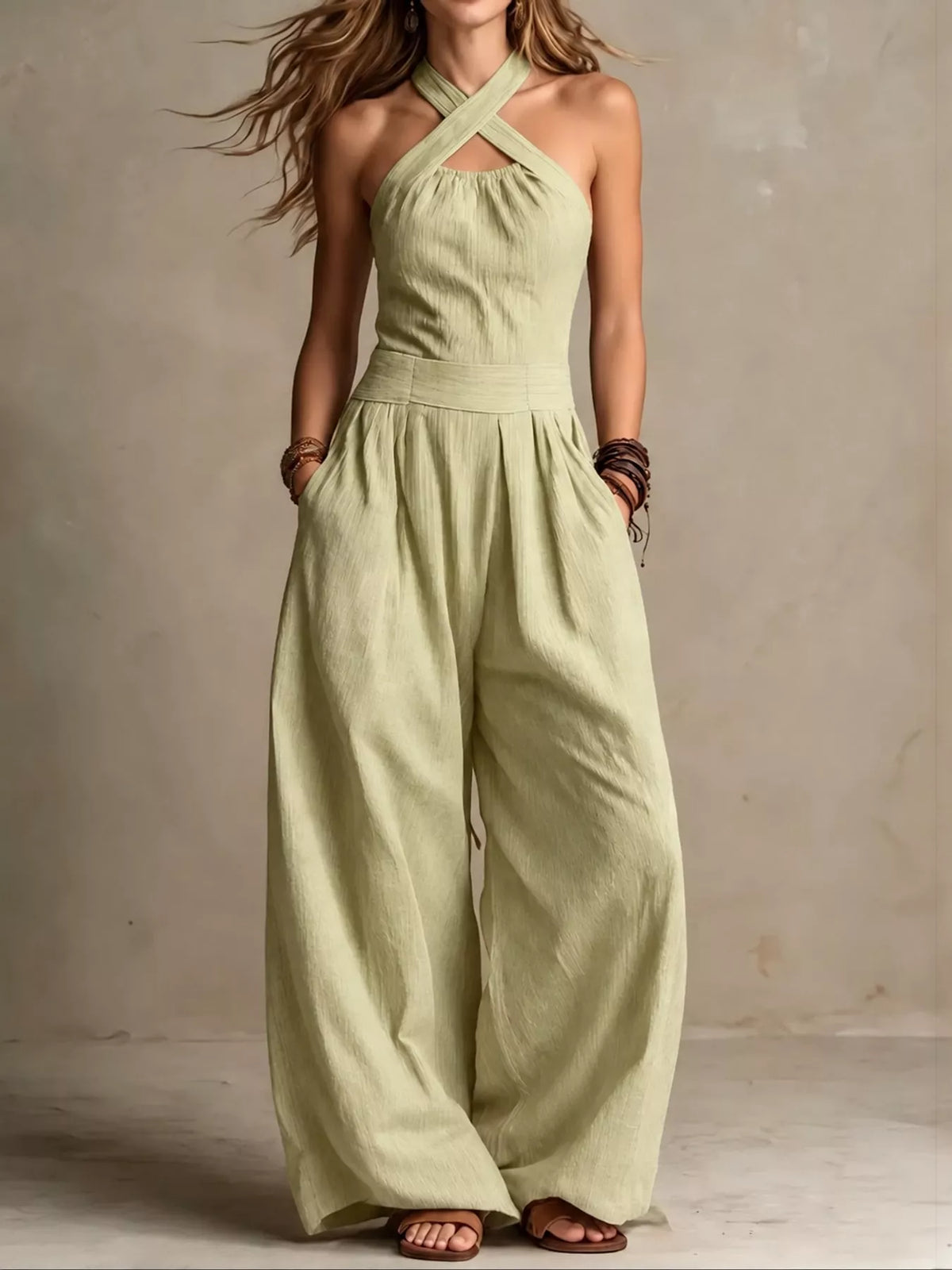 High waist halter linen jumpsuit with gathered bodice and flowy wide-leg pants in sage