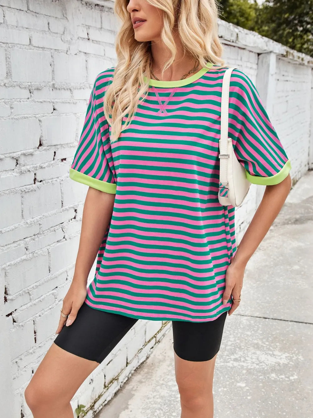 Green and white striped round-neck half-sleeve T-shirt with yellow ribbed sleeve cuffs