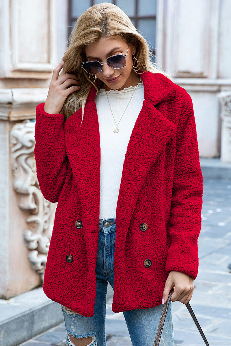 Sherpa coat with lapel collar and double-breasted buttons, deep red sherpa texture.