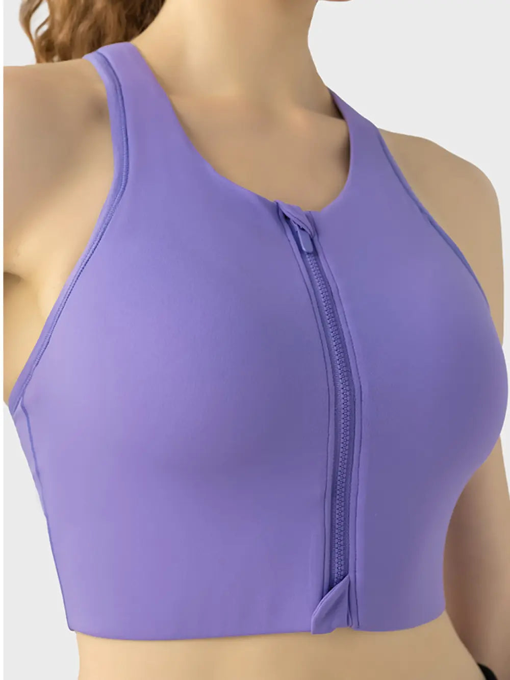 Purple sport bra with full front zipper and high neckline
