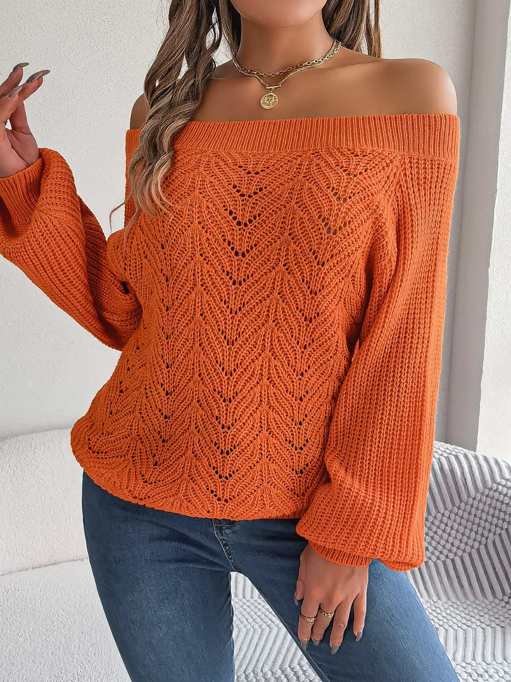 Pumpkin orange off-shoulder long sleeve sweater with openwork diamond knit pattern
