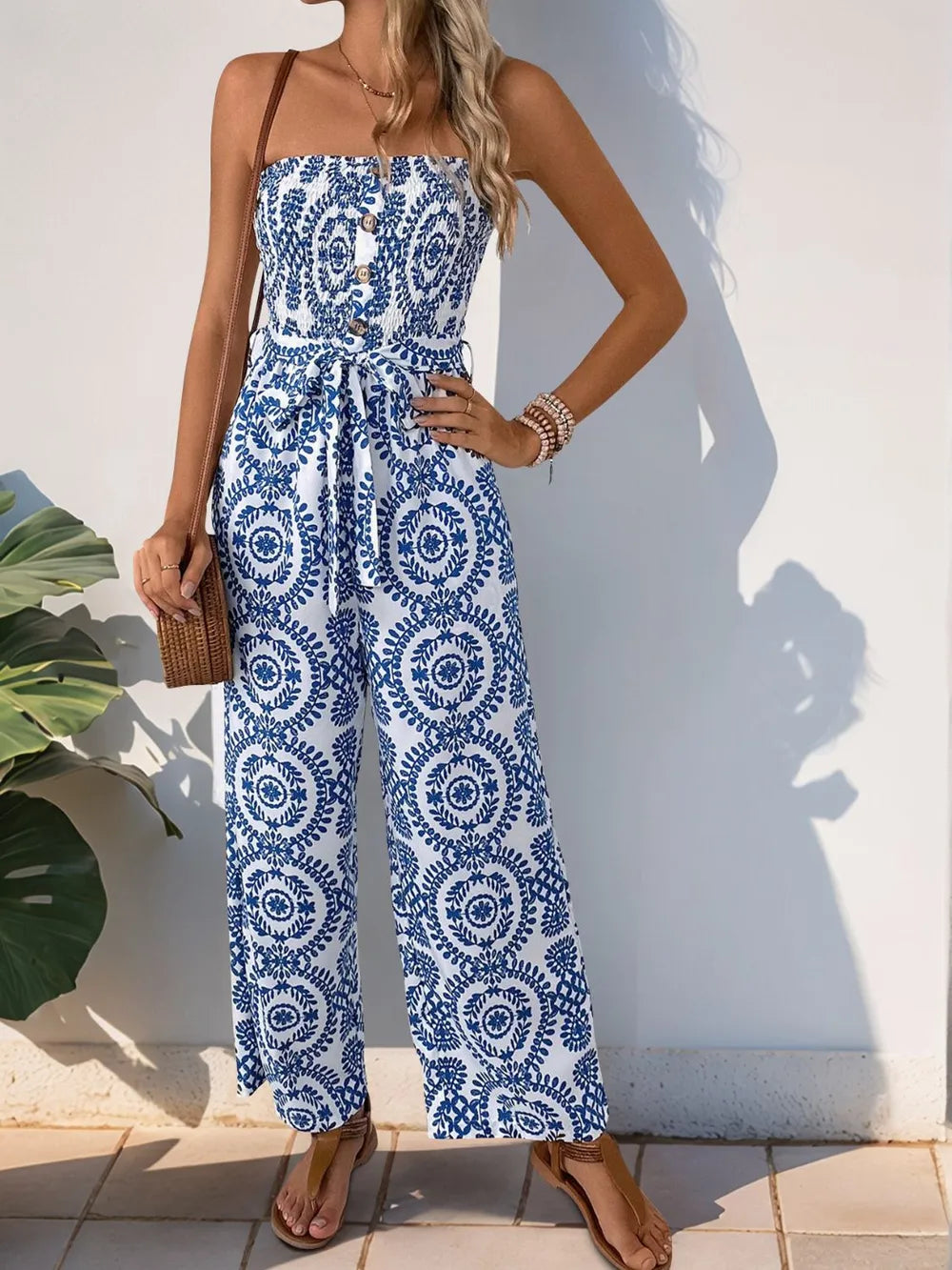 Blue tube wide-leg jumpsuit with navy medallion print, smocked waist detail