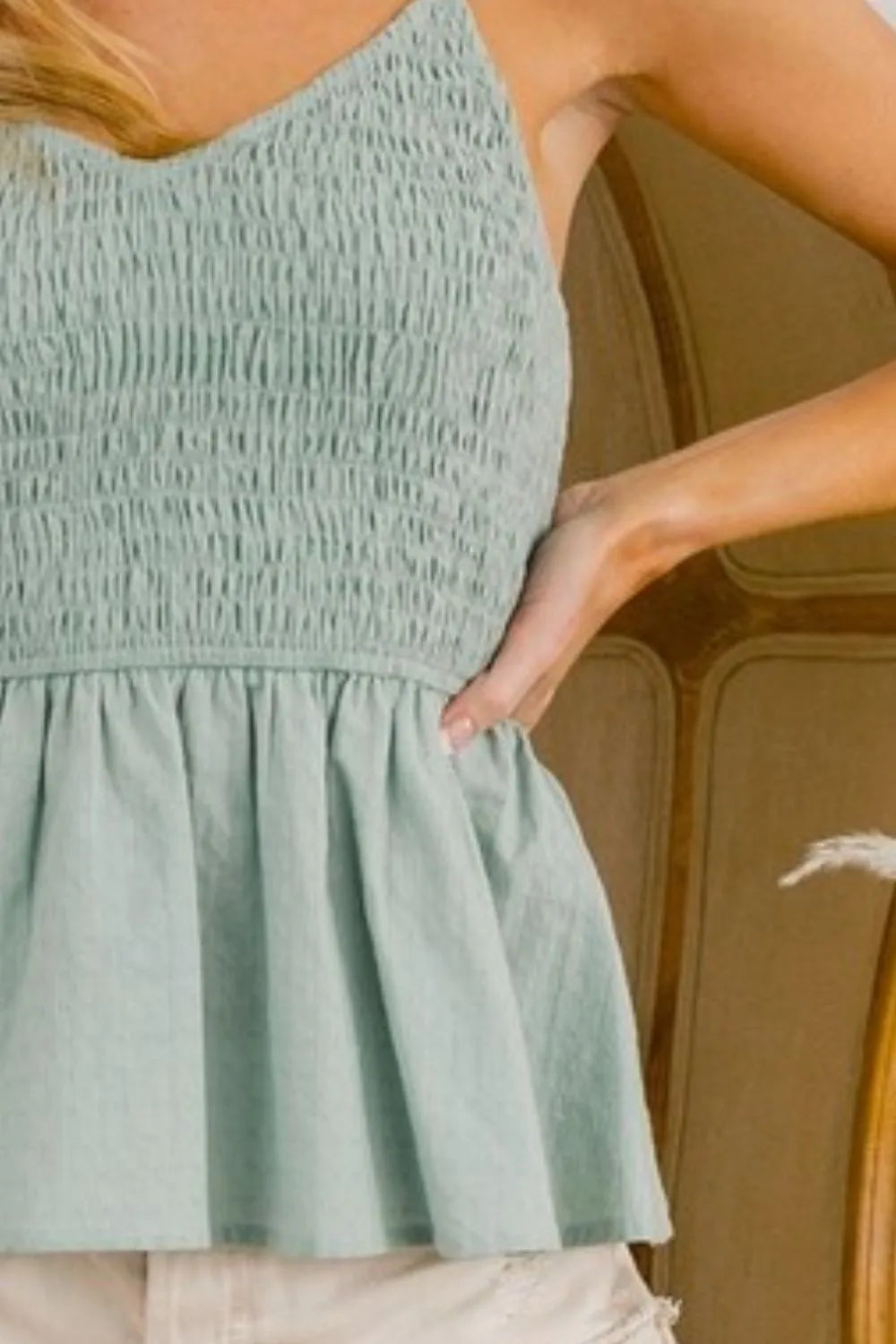Dusty sage woven bodice with textured eyelet pattern and elastic waist gather