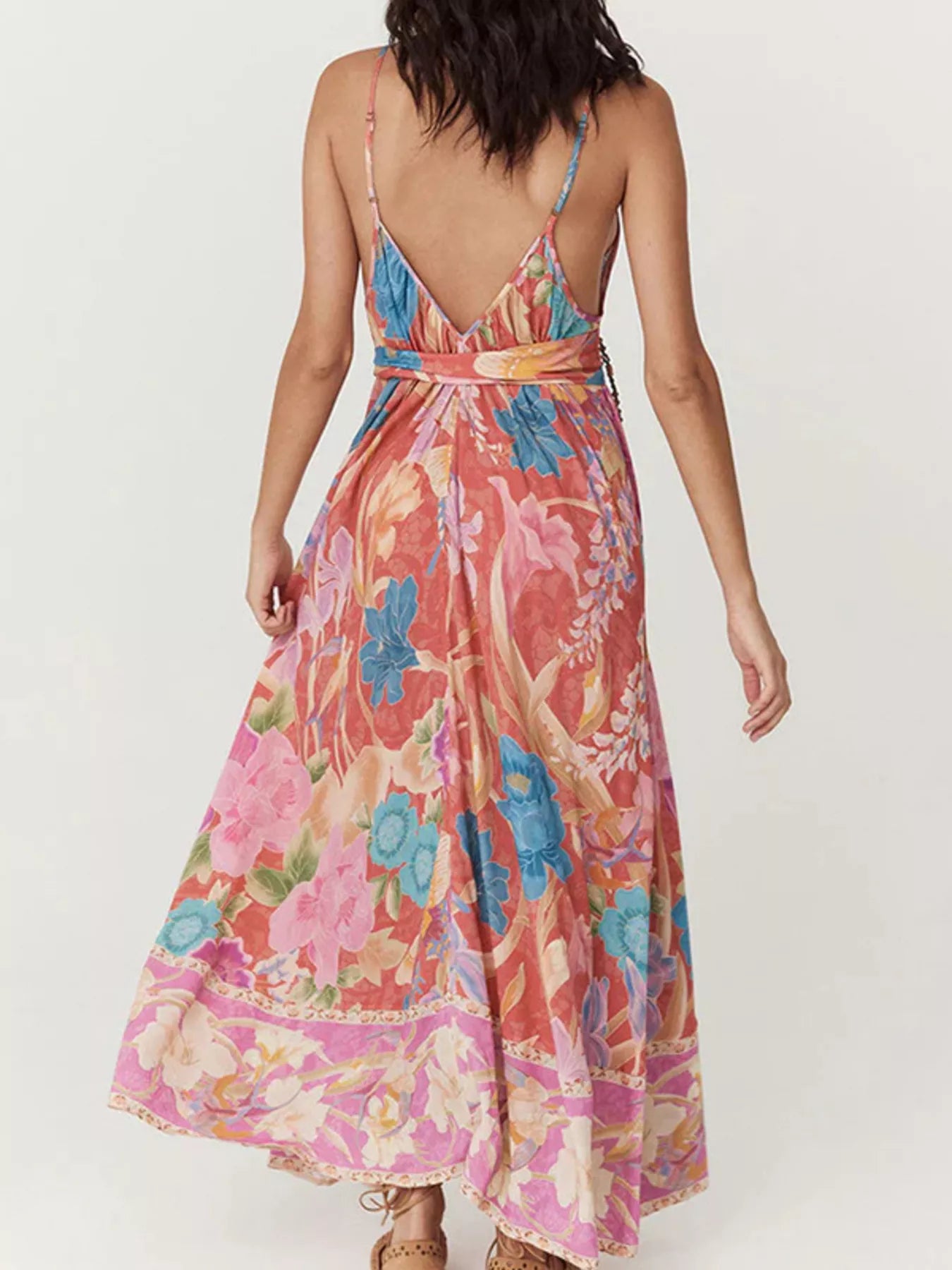 Floral print spaghetti-strap maxi dress by Trendsi, back view with a low V-back and waist belt.