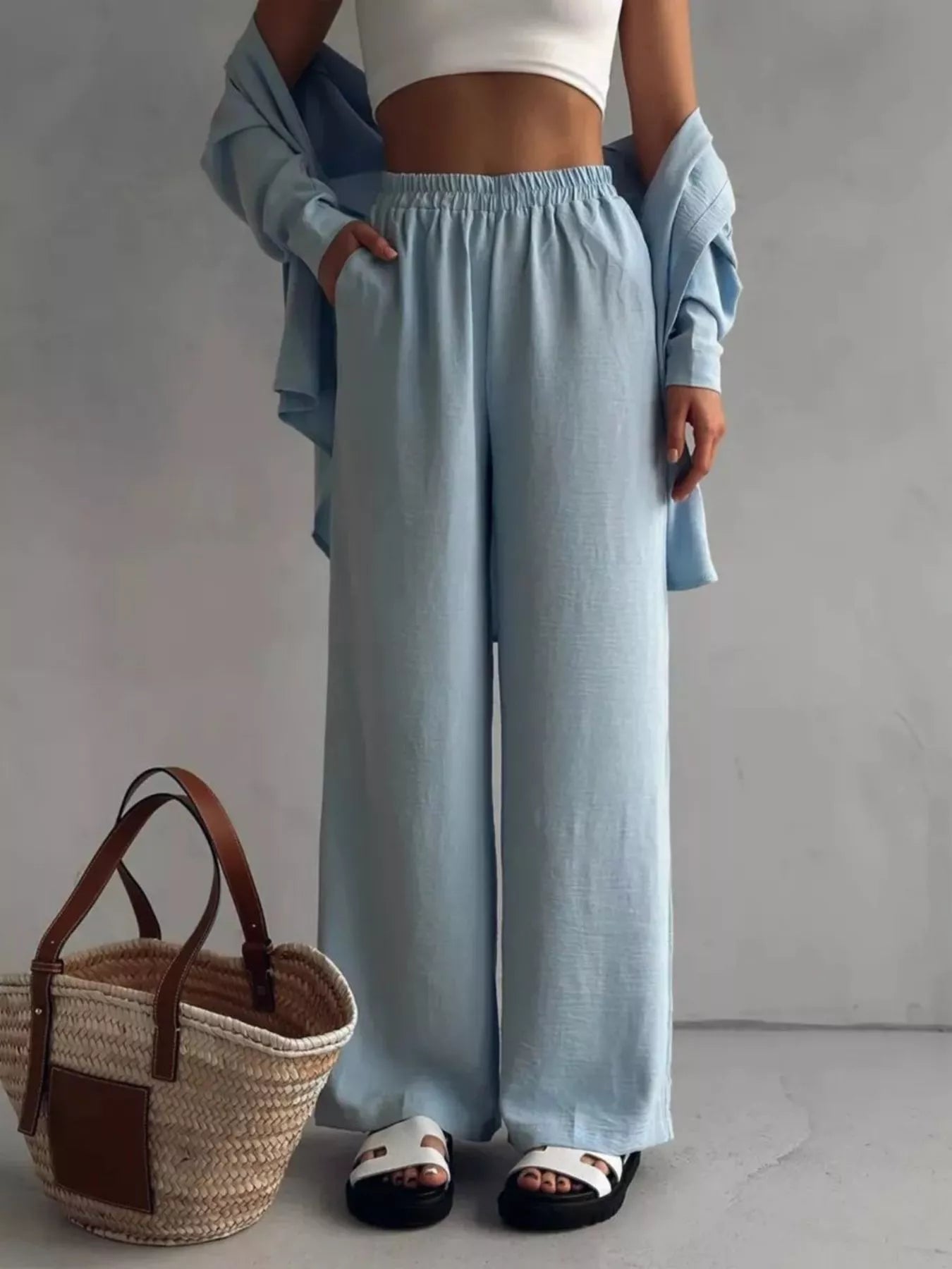 Light blue relaxed-fit shirt and wide-leg pants set, collar and elastic waistband