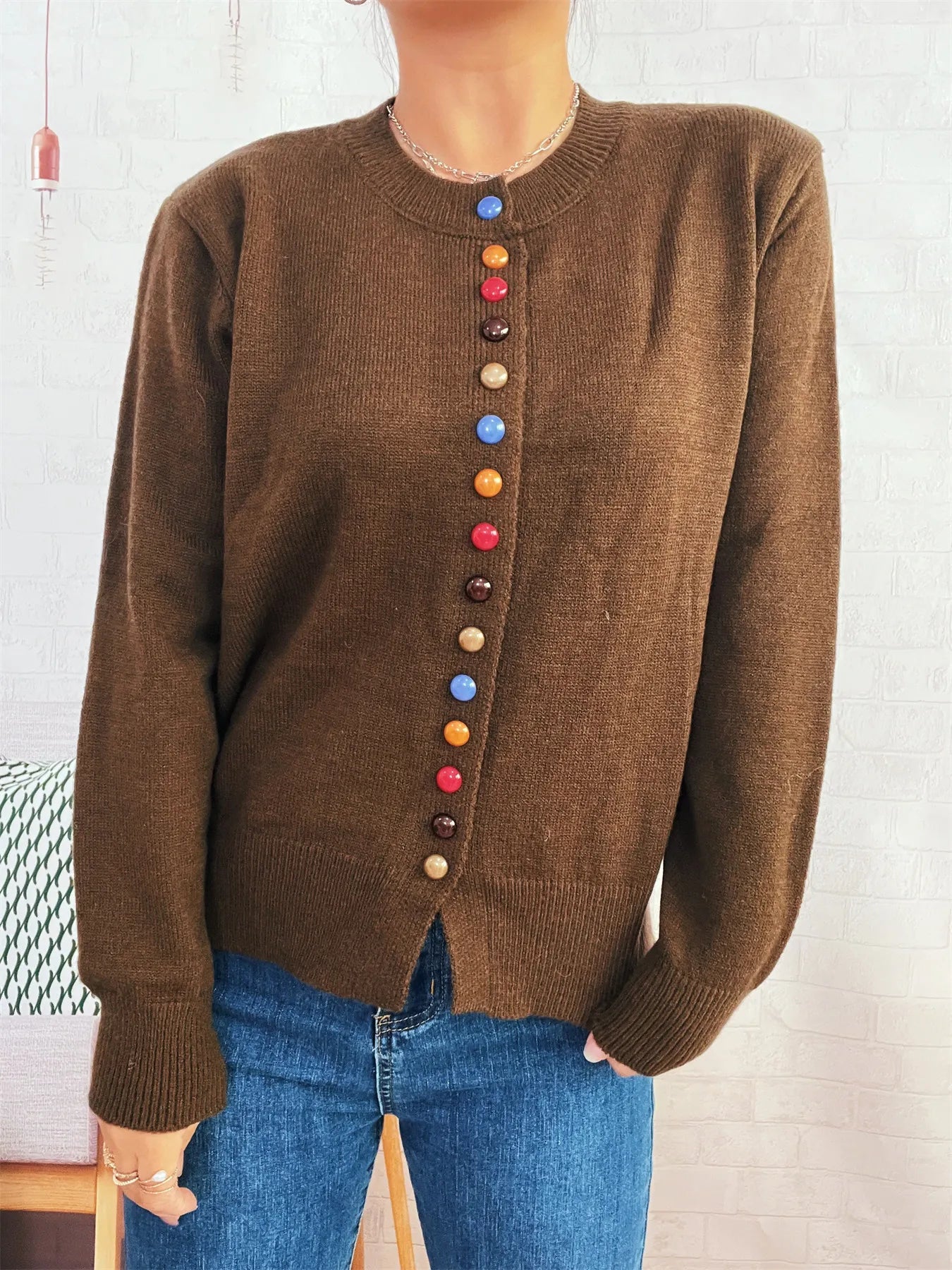Brown button-front cardigan with colorful detail buttons, crew neck, long sleeves