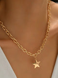 Gold star pendant chain necklace with oval link chain and small center star charm