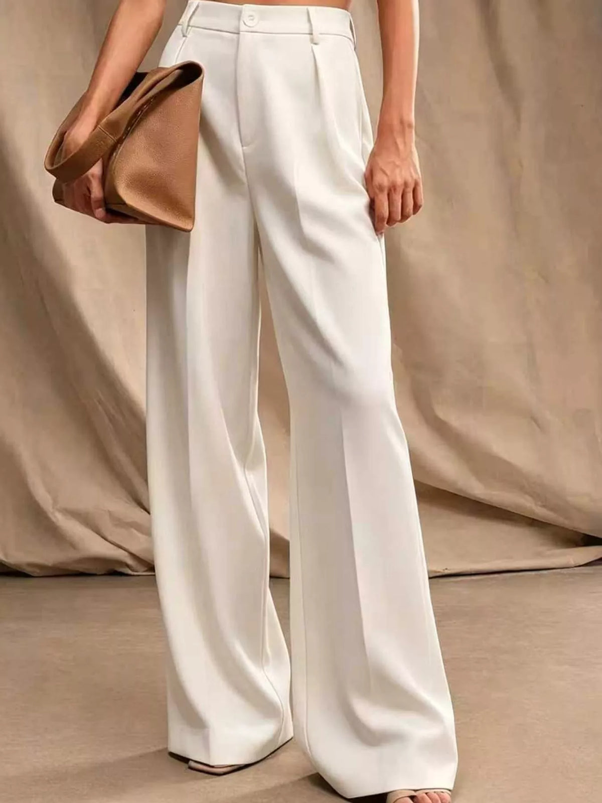 Off-white high-waisted pleated wide-leg pants with button and belt loops