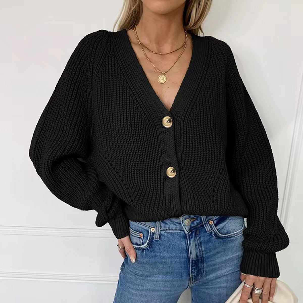 Black button-up V-neck long-sleeve cardigan with ribbed knit and gold-tone buttons
