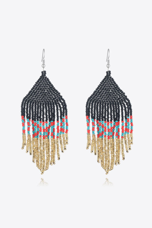 Beaded dangle earrings with black bead top, blue-red band, gold-tone fringe