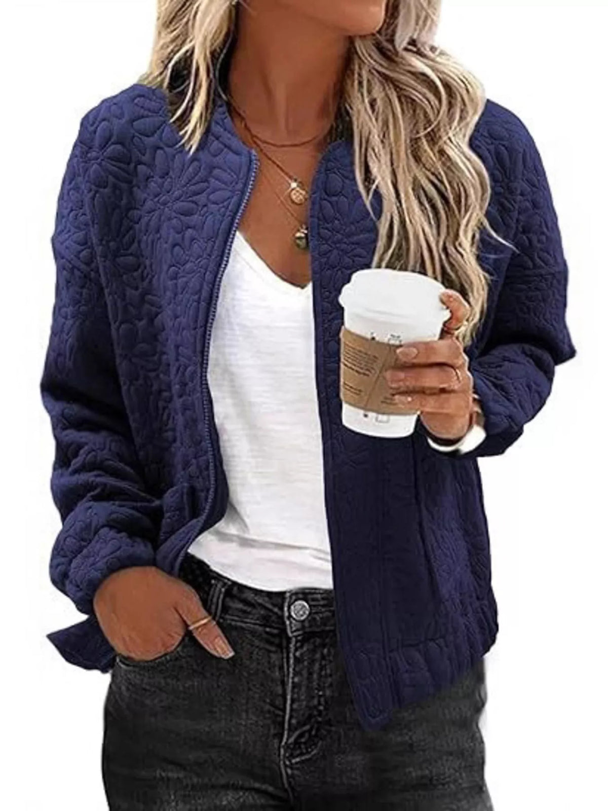Quilted zip-front floral jacket in dark navy, full front view.