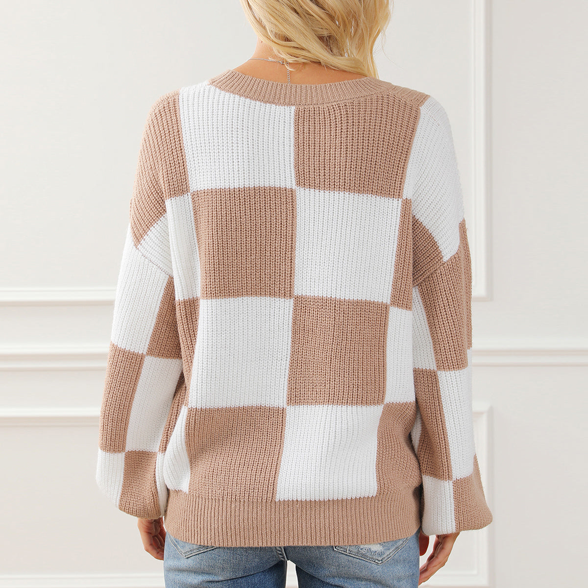 Tan and white checkered sweater back view, round neck, drop-shoulder sleeves
