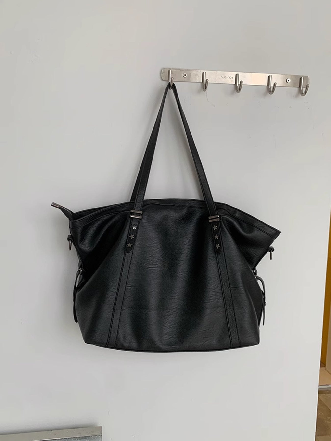 Star-embellished black PU leather shoulder bag, large size with star-stud straps