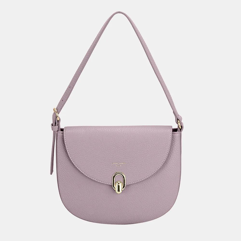 Lilac half-moon shoulder bag with metal buckle clasp and dangling zipper pull.