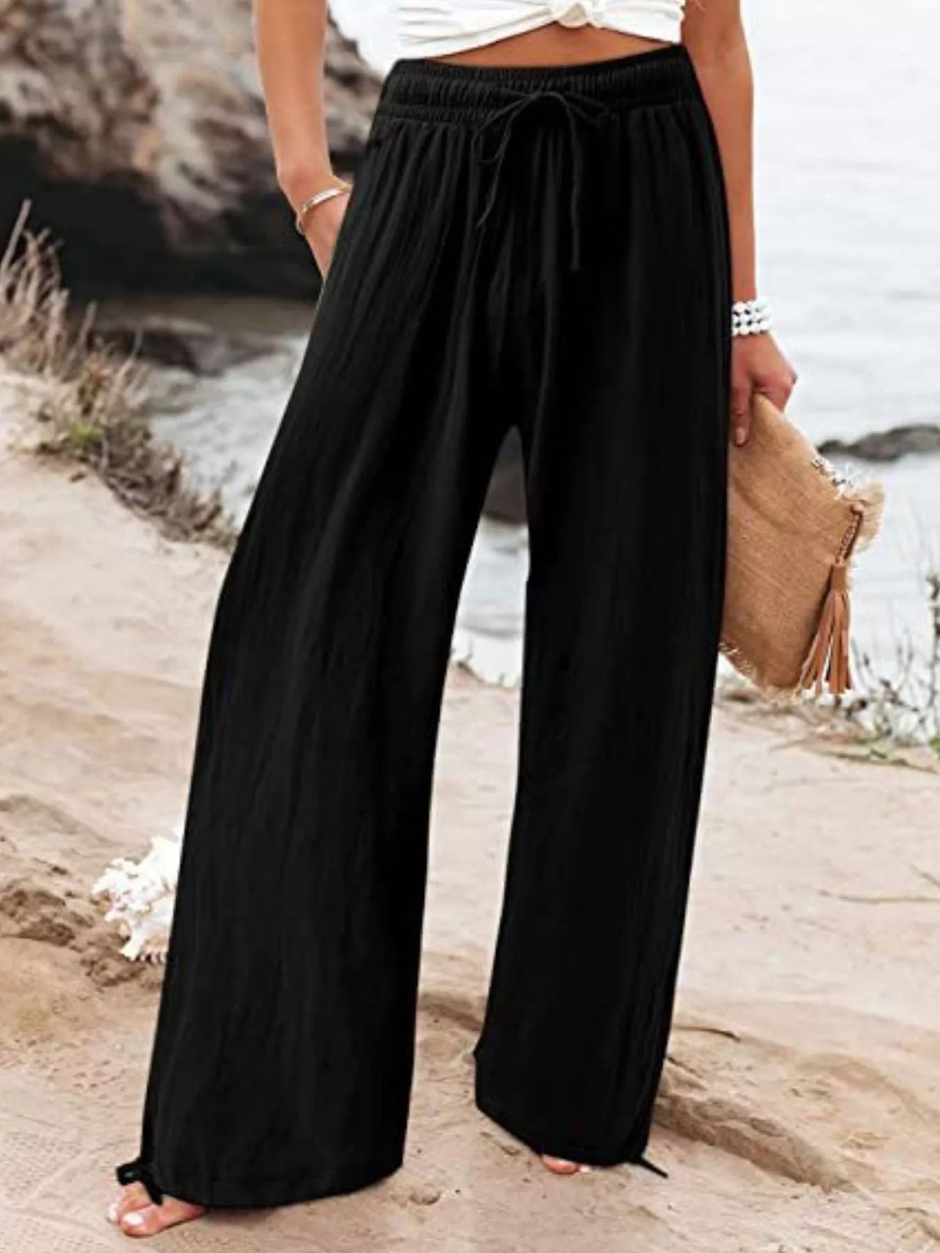 Wide-leg pants in black with elastic drawstring waist