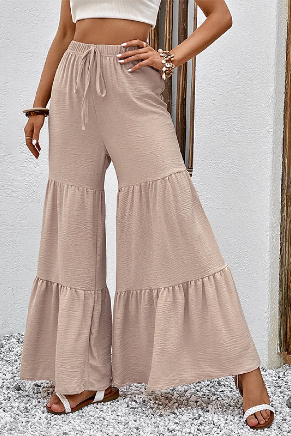 Tan tiered drawstring culottes with wide flared legs